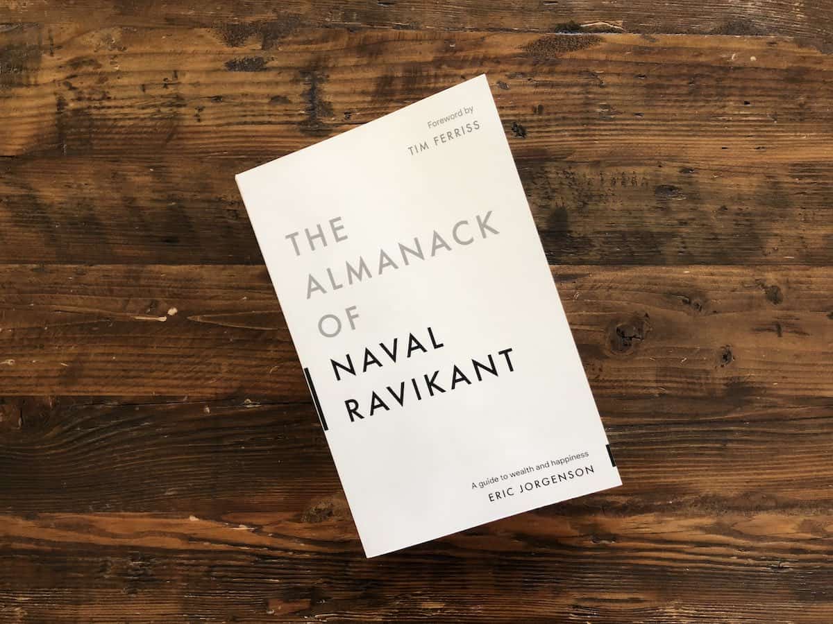 The Almanac of Naval Ravikant by Eric Jorgenson sitting on Coffee Table