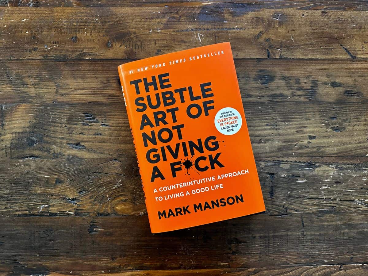 The Subtle Art of Not Giving A F*ck Book on Coffee Table